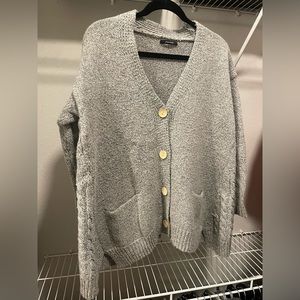 light-gray button up cardigan with pockets